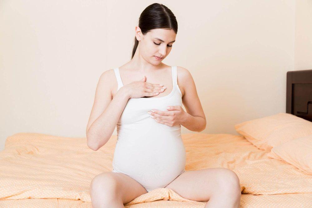 pregnancy me breast pain
